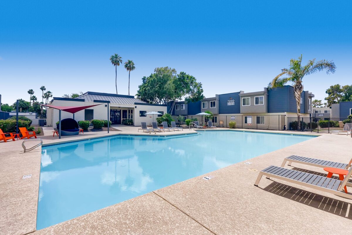Swimming pool with shaded deck seating at Scottsdale Gateway, nice apartments in Tempe